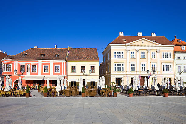 Szechenyi Square with restaurants in downtown Gyor, Hungary