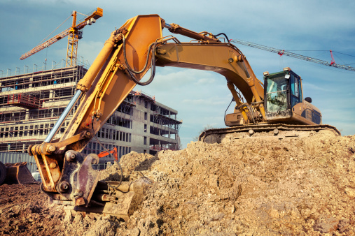 Excavator at construction site - low-angle view