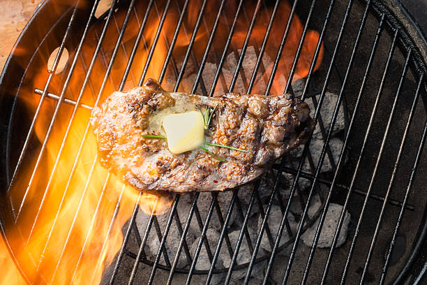 istock Kobe New York Steak on Grill with Fire 169975036