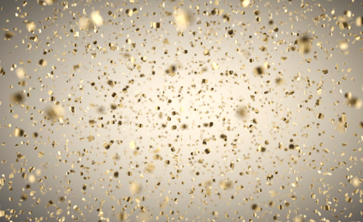 Oro de lluvia de confeti profundidad de campo photo