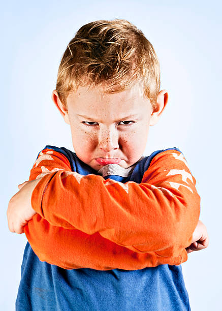 Very grumpy pre-school boy about to have a tantrum!