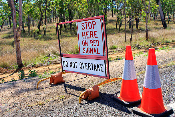 istock Stop Here on red Signal Sign sign at roadworks 169975672