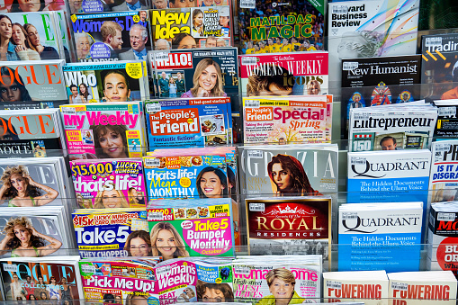 Amsterdam, holland - september 20, 2014: Several colored dutch magazines displayed in a kiosk