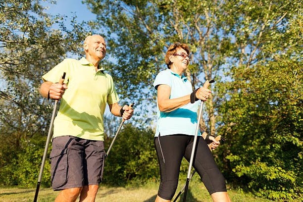 istock nordic walking senior couple 169977237