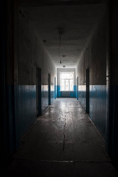 istock Darken long corridor in the obsolete building 169977656