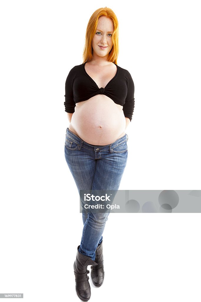 Pregnant young woman Pregnant young woman showing her belly  Abdomen Stock Photo