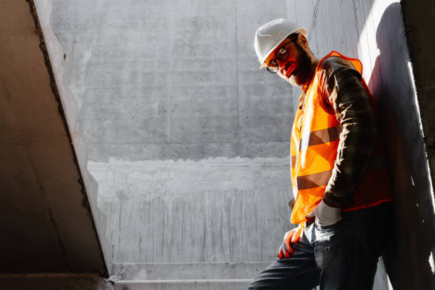 istock Young businessman construction standing on his workplace on the construction site 1699778359