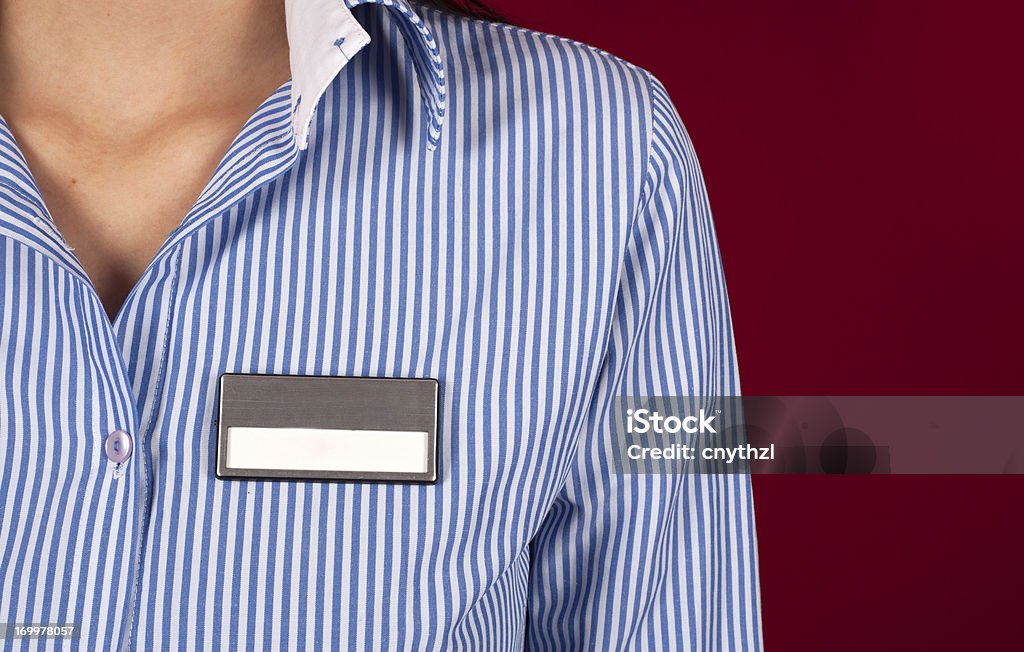 Etichetta nome vuoto sulla maglia - Foto stock royalty-free di Targhetta di identificazione