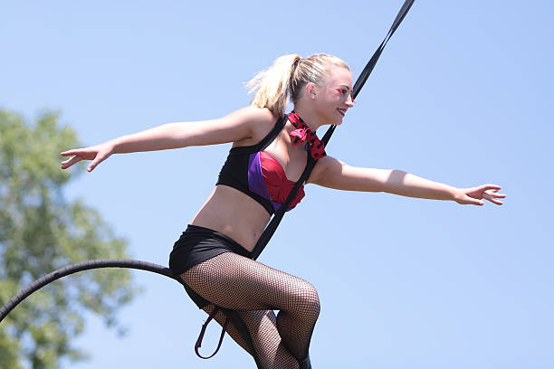 istock Young acrobat swinging on a hoop 169978072