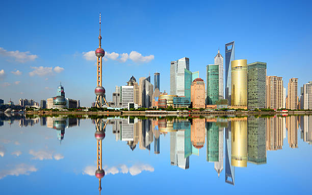 Shanghai, China. Photo of modern buildings by river promenade shanghai stock pictures, royalty-free photos & images