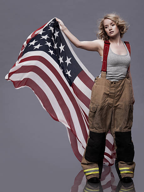 istock Female Holding An American Flag 169978509