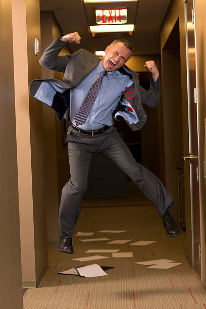 istock Upset Businessman in a hallway 169982418