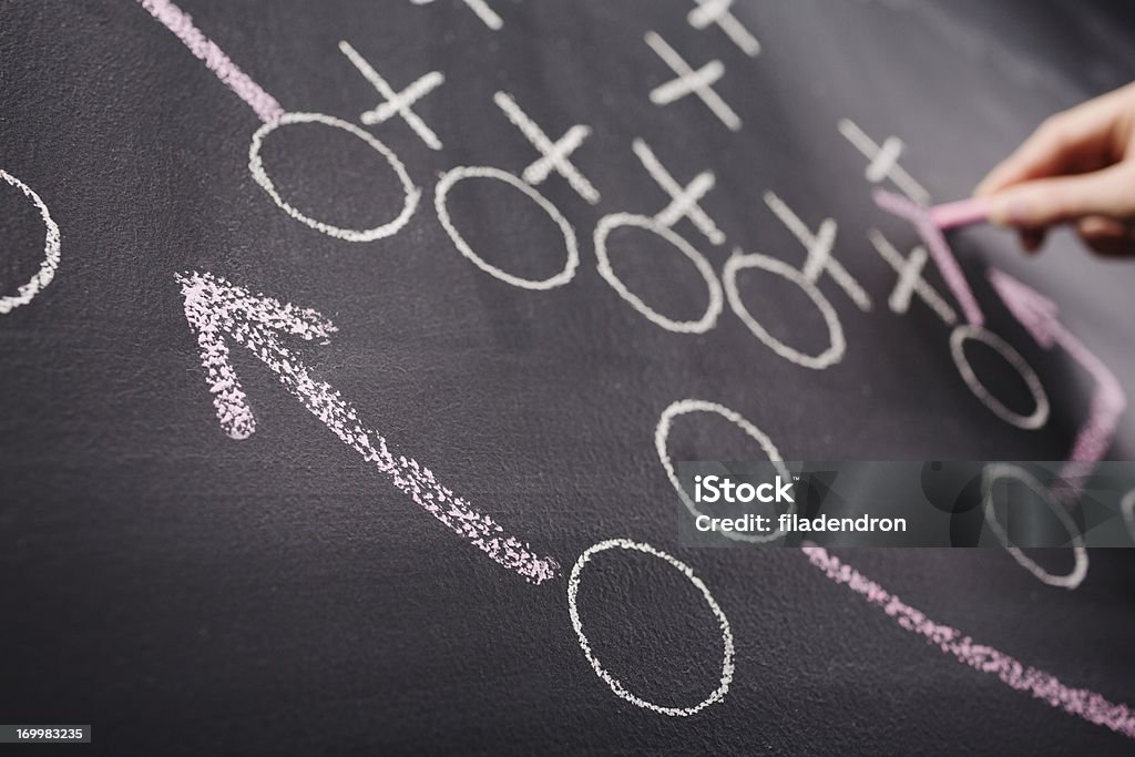 Hand drawing a game strategy Strategy Stock Photo