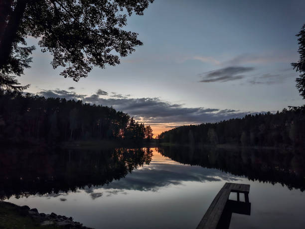 istock Calm lake scape at summer night. 1699834177