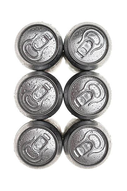 six wet aluminium drink cans stock photo