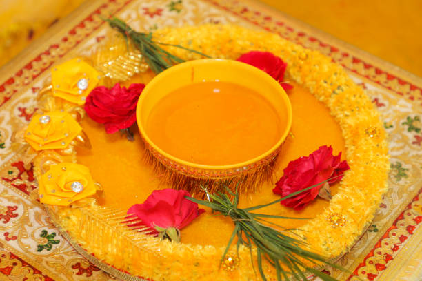 istock Groom and bridal marriage ritual haldi function decorative plat 1699839180