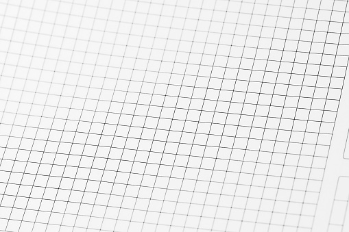 Graph paper texture background with empty grid columns set on an angle with a pattern of gray checkers lines from an accounts notebook.