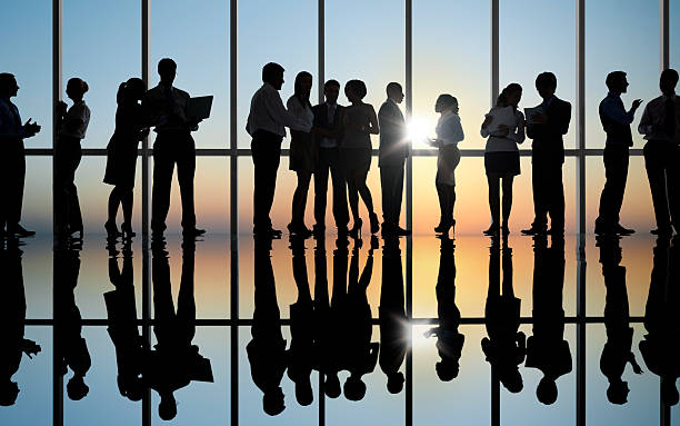 istock Silhouette of business colleagues working 169987154