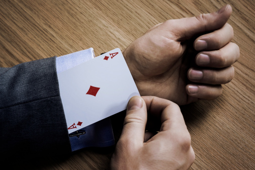 Businessman with an ace in his sleeve