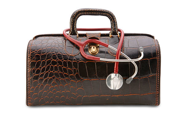 House Call with Path Doctor's Bag and Stethoscope isolated on a white background. Clipping path included. leather medical bag stock pictures, royalty-free photos & images