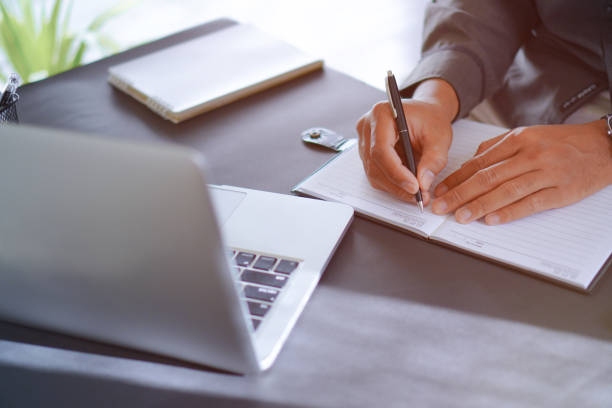 istock Businessman Working at Desk with Laptop, Professional Workplace Concepts 1699903590
