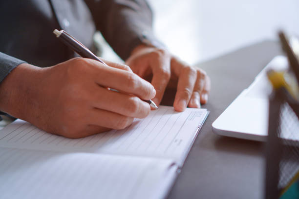 istock Businessman Working at Desk with Laptop, Professional Workplace Concepts 1699904270