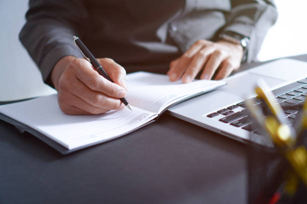 istock Businessman Working at Desk with Laptop, Professional Workplace Concepts 1699905014