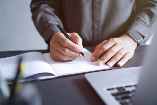 istock Businessman Working at Desk with Laptop, Professional Workplace Concepts 1699905035