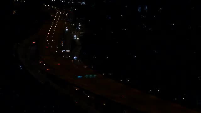 Footage stock video, bird eyes view on night road, city night light traffic, city scape background, bird’s eye view, top view