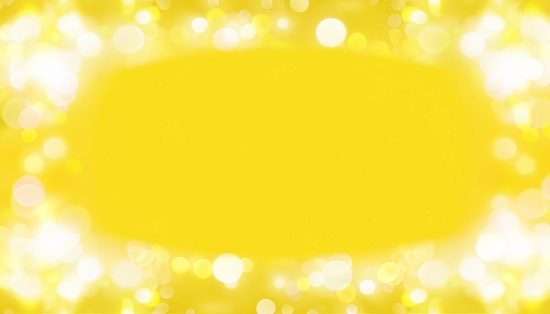 Bright yellow background with scattered shimmering ball blur, text space available