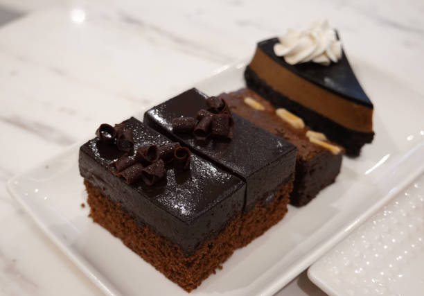 istock Mini cakes with chocolate and cheesecake 1699916300