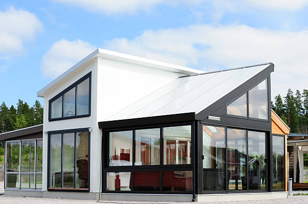 Modern scandinavian style villa Open solution, large windows, wooden. Wooden veranda. white buildings stock pictures, royalty-free photos & images