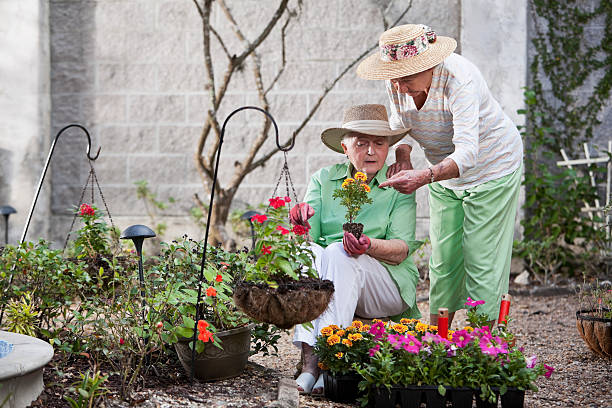 istock Elderly women gardening 169994071