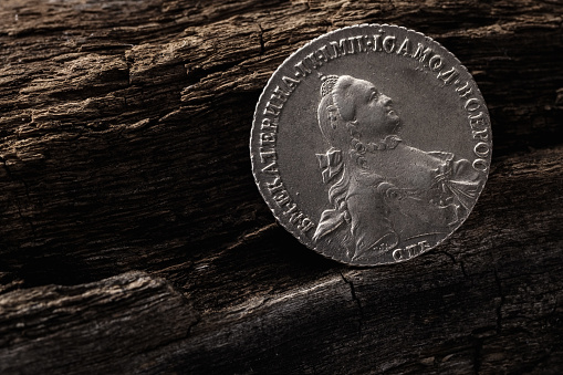 Numismatics. Old collectible coins on the table. Top view.