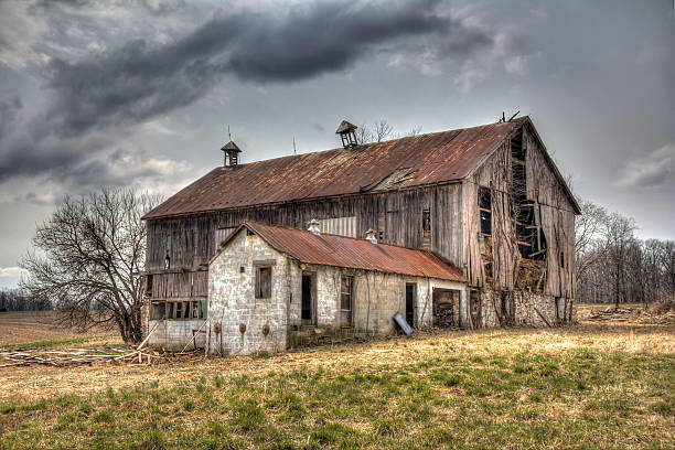 Abandoned Barn, Cloud Filled Sky  HDR stock photo