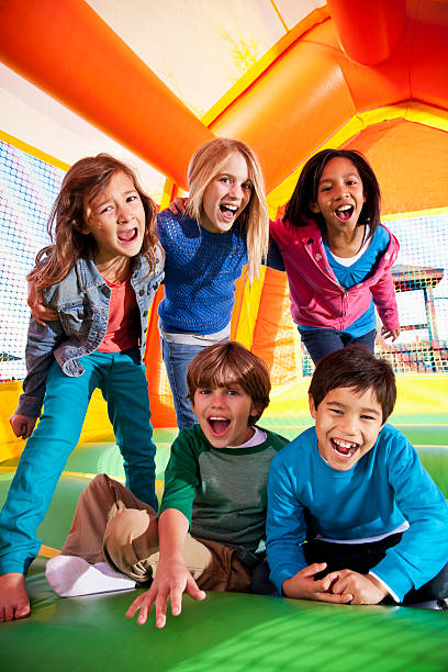 istock Children in bounce house 169996538