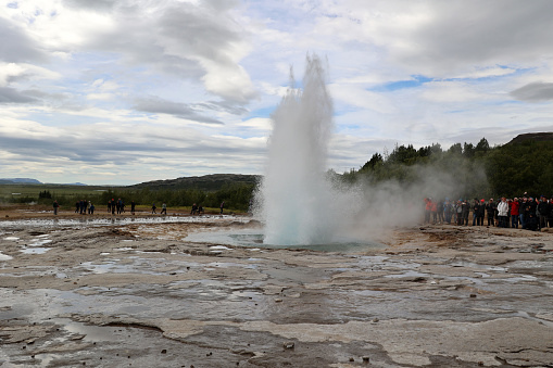 Haukadalur, Iceland: - The geyser is located next to the rarely erupting Great Geyser in the hot water valley of Haukadalur