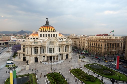 Late afternoon at the Palacio de Bellas Artes (Spanish for Palace of Fine Arts), Mexico City's main opera and theatre house. A extravagant marble neoclassical structure inaugurated in 1934. Mexico City, Mexico.