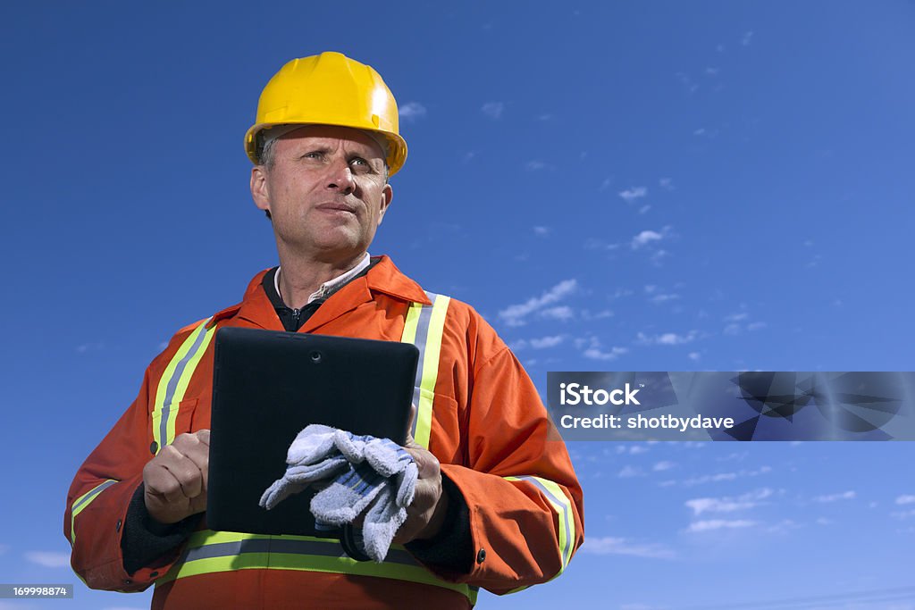 Operaio e Tablet PC - Foto stock royalty-free di Minatore