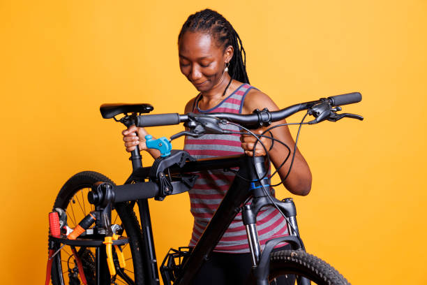 istock Annual bicycle maintenance with a woman 1699990380