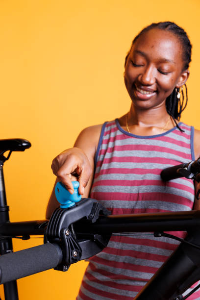 istock Passionate Woman Repairing Bicycle 1699993649