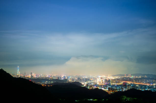 istock A dreamy cityscape surrounded by clouds and fog. 1699999574
