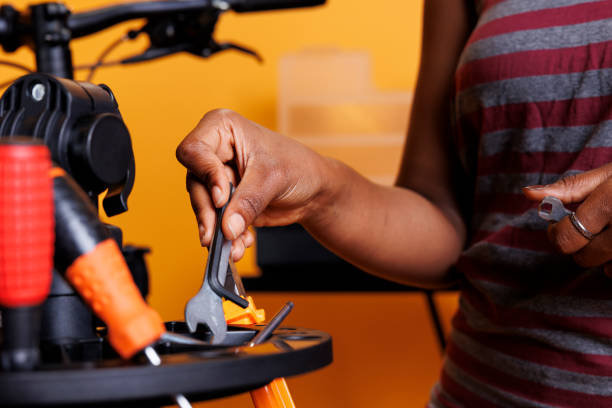istock Female organizing bicycle repair tools 1700000705