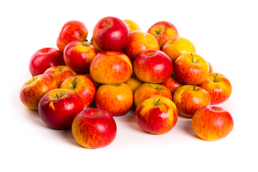 delicious red-yellow apples on white background