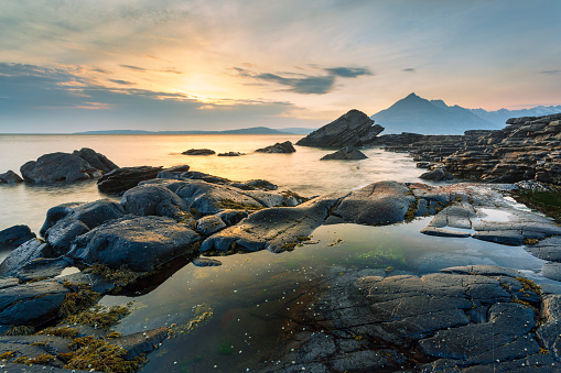 Sunset at Elgol Beach looking toward Black Cuillin, The small scattered hamlet of Elgol lies on the shores of Loch Scavaig on the south coast of Isle of Skye, Scotland.