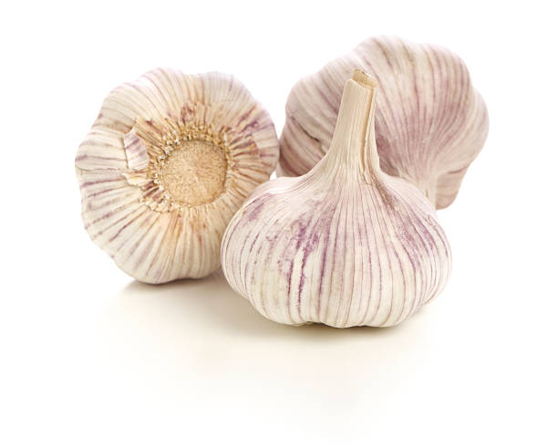 istock Fresh Garlic Bulbs  isolated on white background 170001405