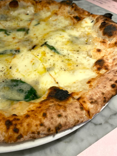 istock Pizza with mozzarella cheese and zucchini, close up 1700021938