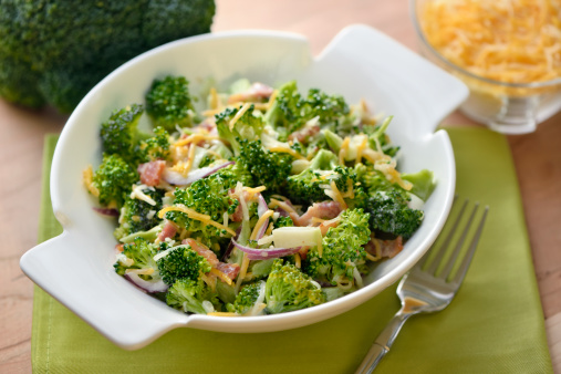 Salad bowl with broccoli salad - ingredients: broccoli, cheddar cheese, red onion, bacon with mayonnaise, sugar and vinegar dressing