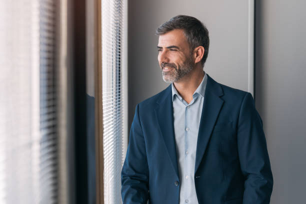 istock Businessman looking away 1700037872