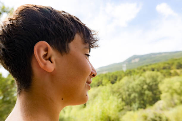 istock young man looking out over the landscape 1700038395